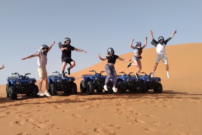 merzouga Desert 1 hour or two hour Quad Bike, and sandboarding - Sandboarding down the dunes