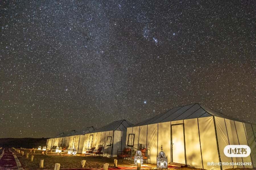 Merzouga: Overnight Stay in Luxury Desert Tent with Dinner - Berber drums under the Sahara sky