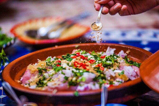 Moroccan Cooking Class and Fez Market Visit and Meal - Learning Moroccan dishes with a local chef