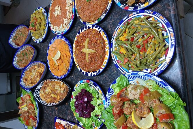 Moroccan Cooking Class and Fez Market Visit and Meal - Sitting down to a full Moroccan meal