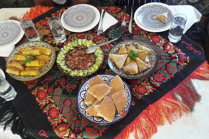 Moroccan Cooking Class & Marrakech Market Visit with Chef Khmisa - Cooking with Chef Khmisa and Kawtar