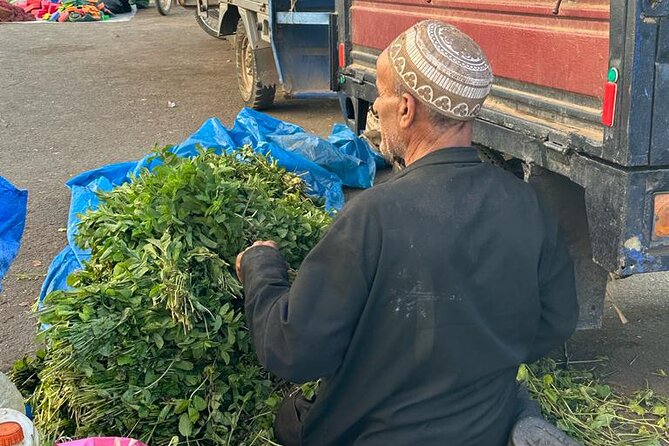 Old local Market visit+Moroccan cooking class with a local family - Sitting down to a family-style meal