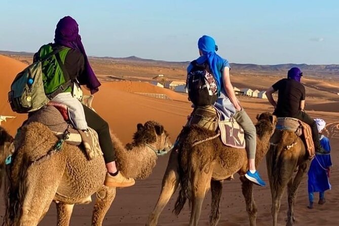 Overnight stay in desert camp & Camel trekking in the Sahara - Sunset above the desert camp