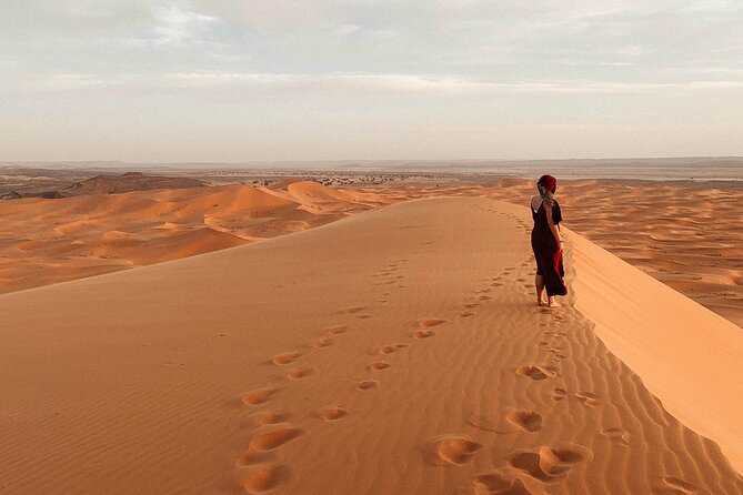 Overnight Tour From Fes to Sahara Desert - Riding into the dunes at sunset
