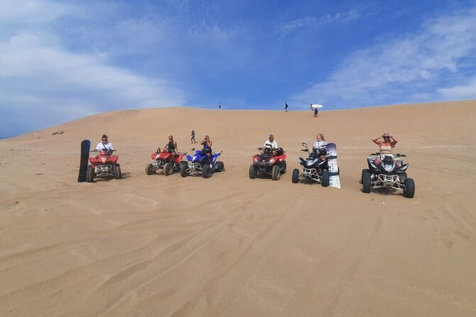 Quad Bike and Sandboarding on Sand Dunes Wild Beach - Booking, timing, and cancellation details
