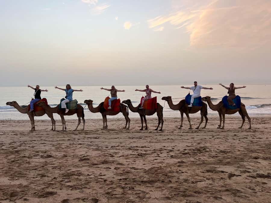 Tangier: Sunset, Tea, Sweets, Camel Ride, and Hercules Caves - Riding a camel as the sun drops